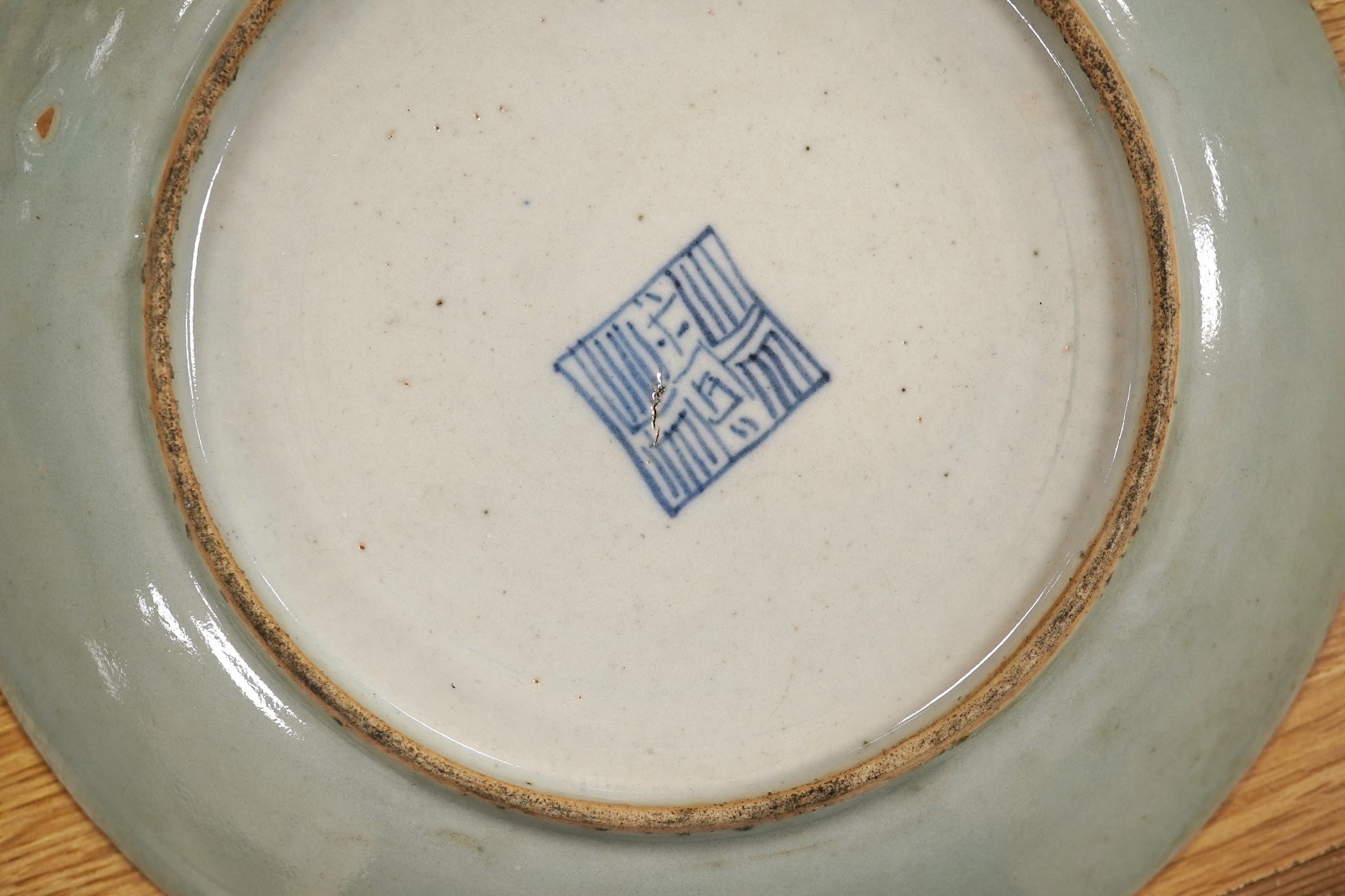 Four 19th century Chinese famille rose celadon ground dishes, largest 25cm